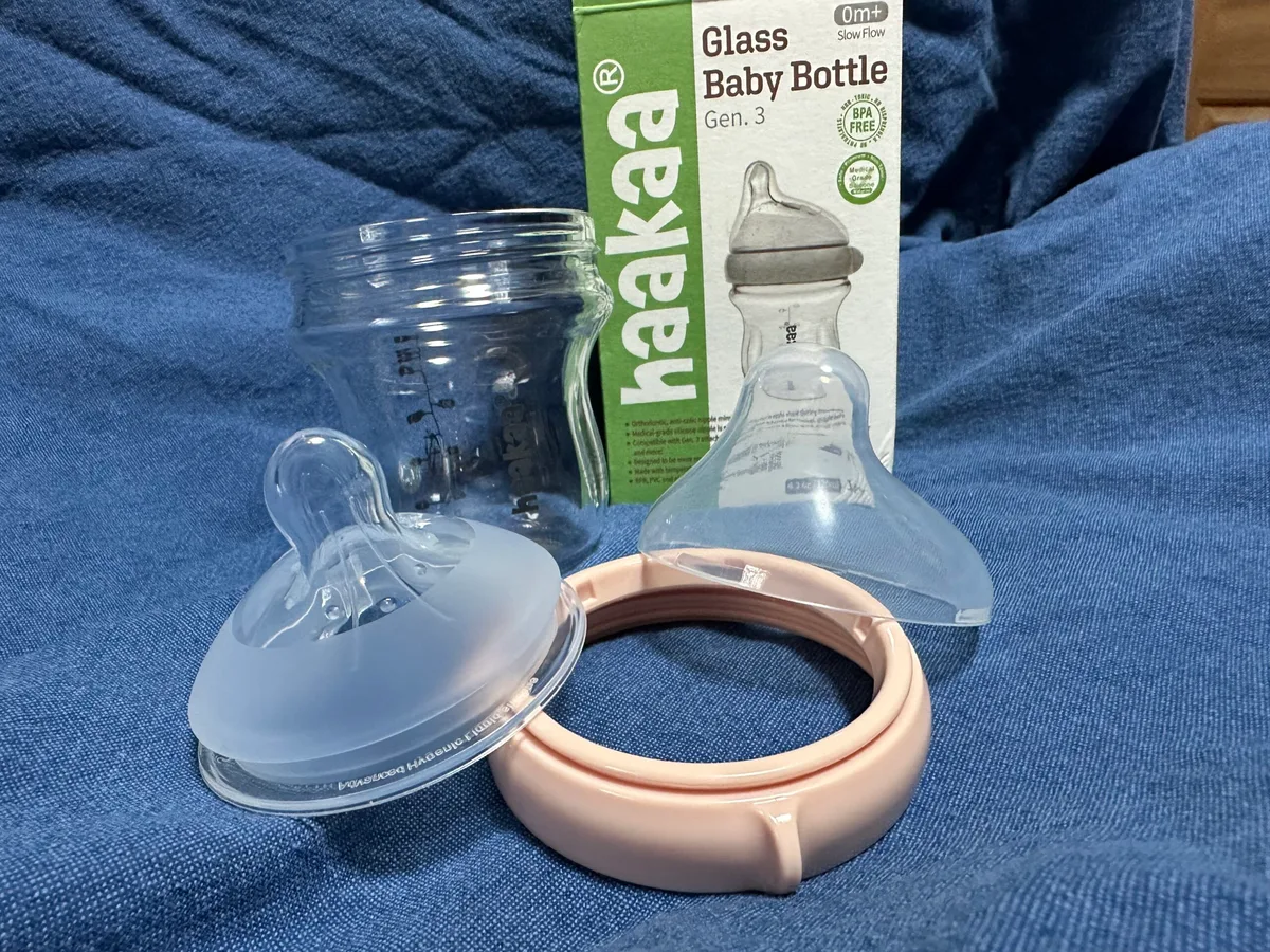 glass baby bottle feeding